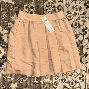 BCBG Beige ruffle mini skirt with pockets, NWT soft girl energy